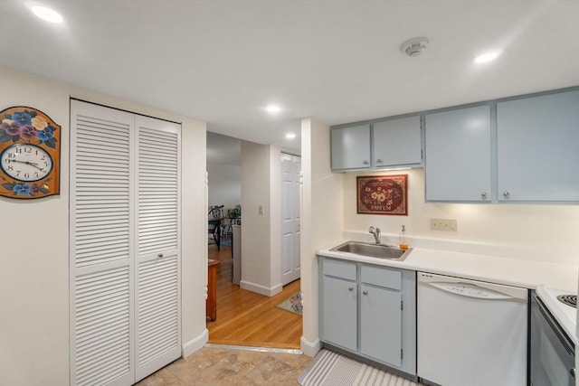 49 Melrose St Unit 4E, Melrose, MA 02176 - kitchen featuring white dishwasher, a sink, range, gray cabinetry, and recessed lighting