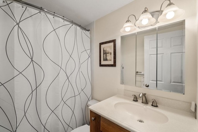 49 Melrose St Unit 4E, Melrose, MA 02176 - bathroom featuring vanity, toilet, and a shower with curtain
