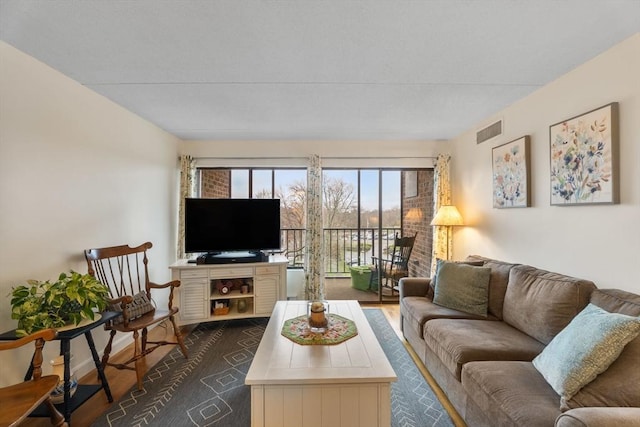 49 Melrose St Unit 4E, Melrose, MA 02176 - living area with dark wood finished floors and baseboards