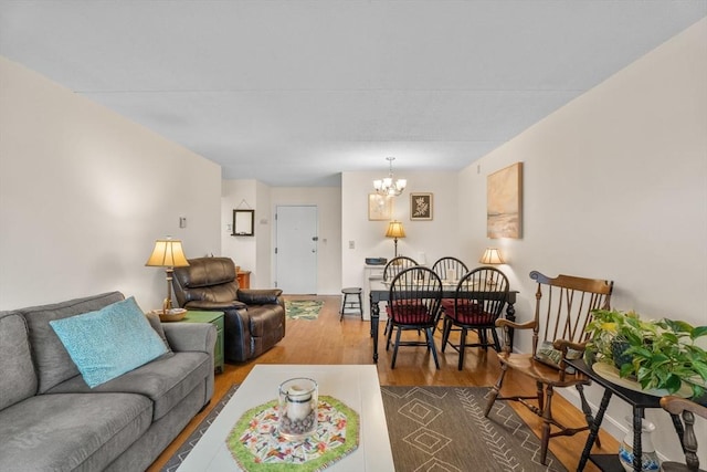49 Melrose St Unit 4E, Melrose, MA 02176 - living area featuring a chandelier and dark wood-style flooring