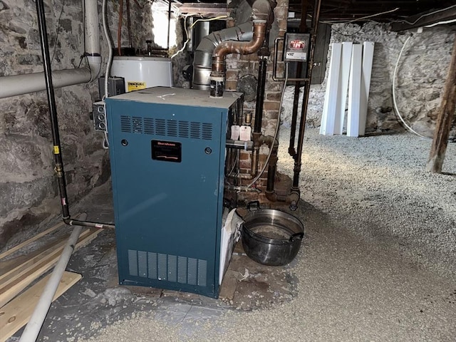 utilities featuring a heating unit and water heater