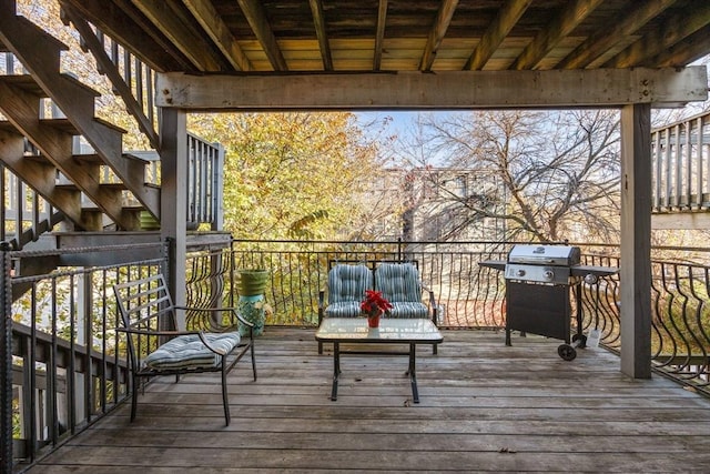 wooden deck with grilling area