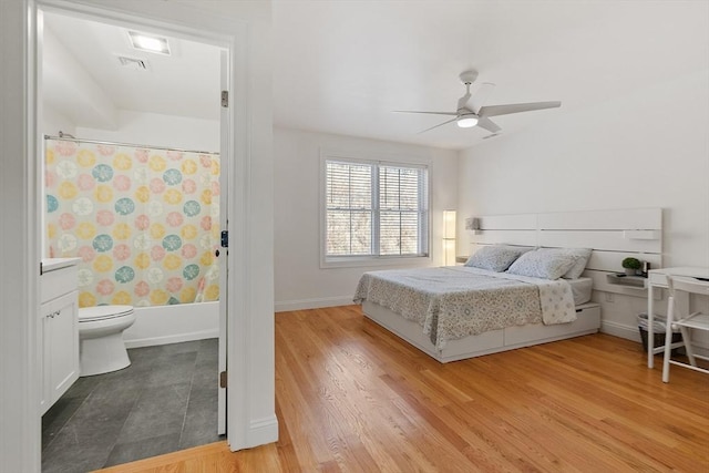 bedroom featuring wood-type flooring and ceiling fan