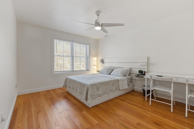 bedroom featuring hardwood / wood-style flooring and ceiling fan