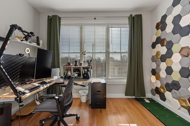 office space with light hardwood / wood-style flooring