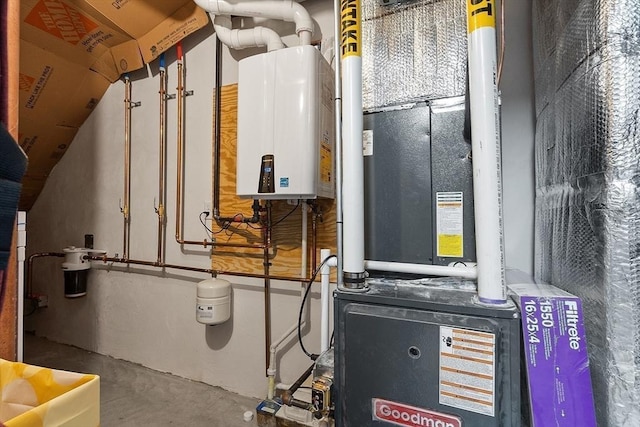 utility room featuring water heater