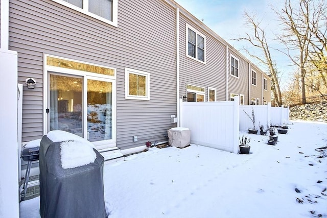 view of snow covered property