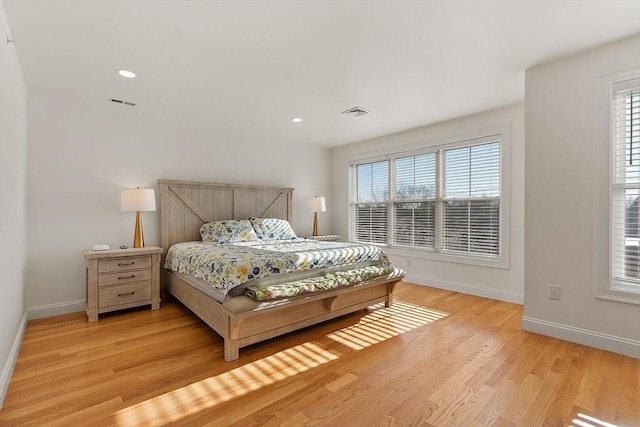 bedroom with light hardwood / wood-style floors