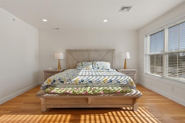 bedroom with light wood-type flooring