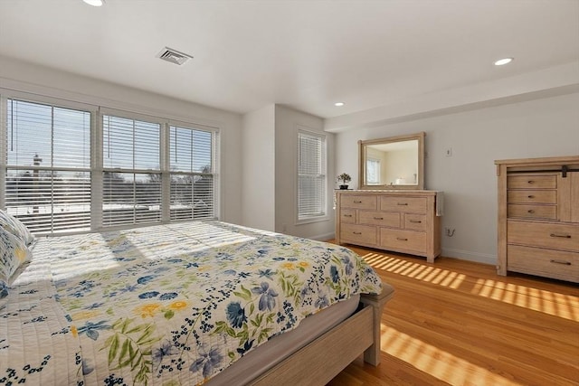 bedroom featuring light hardwood / wood-style floors