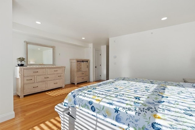 bedroom with light wood-type flooring