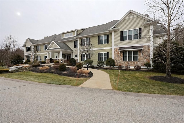 view of front facade with a front yard