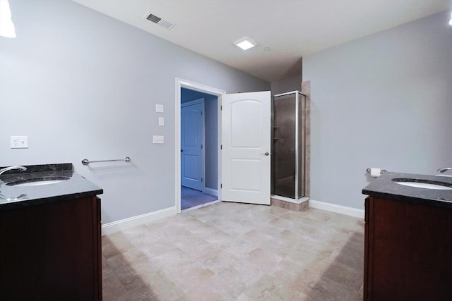 bathroom with vanity and walk in shower