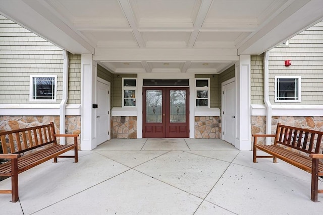 doorway to property with french doors and a patio area