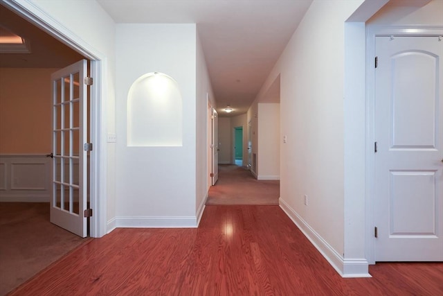 corridor featuring hardwood / wood-style flooring