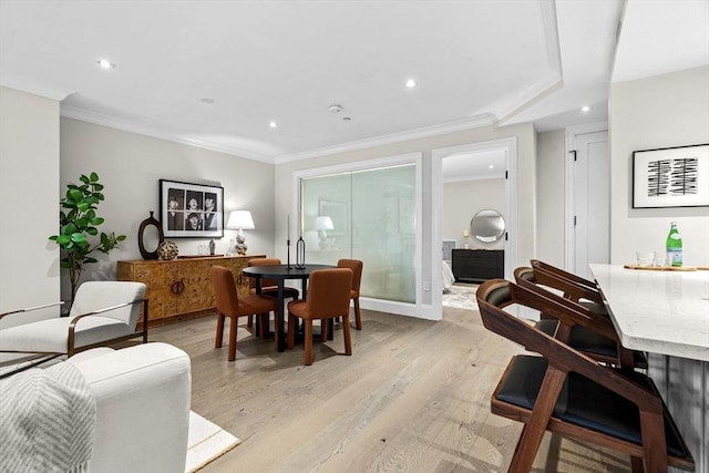 407 Shawmut Ave Unit 1, Boston, MA 02118 - dining space with light wood finished floors, ornamental molding, and recessed lighting