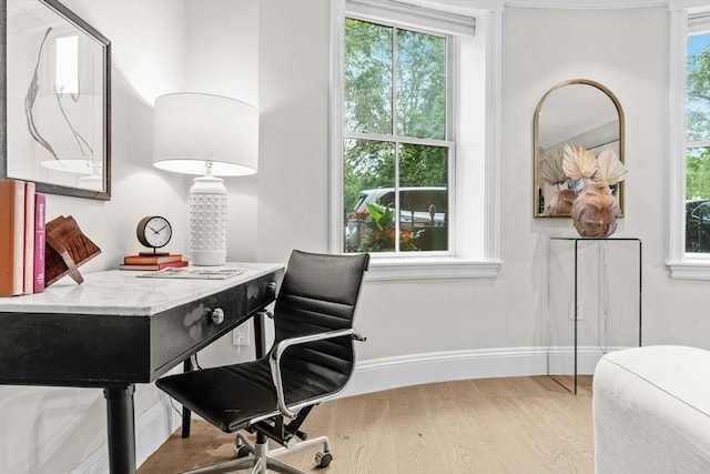 407 Shawmut Ave Unit 1, Boston, MA 02118 - home office featuring wood finished floors and baseboards