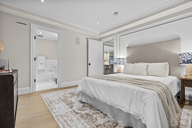 407 Shawmut Ave Unit 1, Boston, MA 02118 - bedroom featuring light wood-type flooring, ensuite bathroom, and recessed lighting