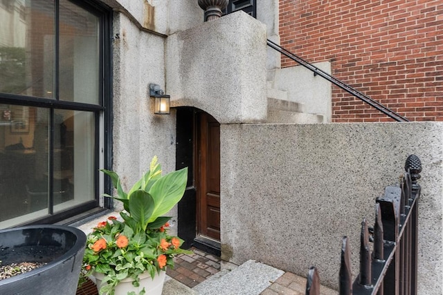 407 Shawmut Ave Unit 1, Boston, MA 02118 - view of exterior entry featuring brick siding and stucco siding