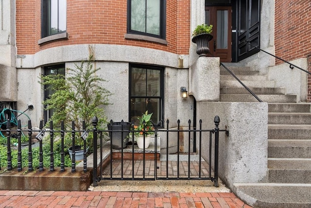 407 Shawmut Ave Unit 1, Boston, MA 02118 - view of exterior entry featuring brick siding and a gate