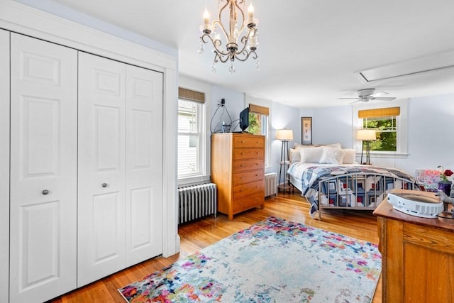 19 Beal Rd, Waltham, MA 02453 - bedroom featuring radiator, attic access, and light wood-type flooring
