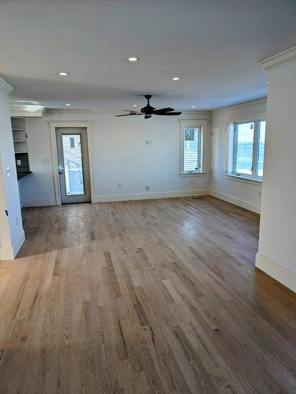 unfurnished living room with recessed lighting, baseboards, wood finished floors, and ceiling fan