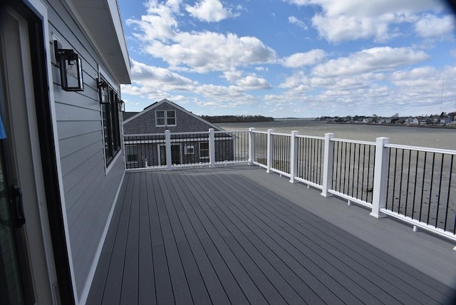 deck featuring a water view