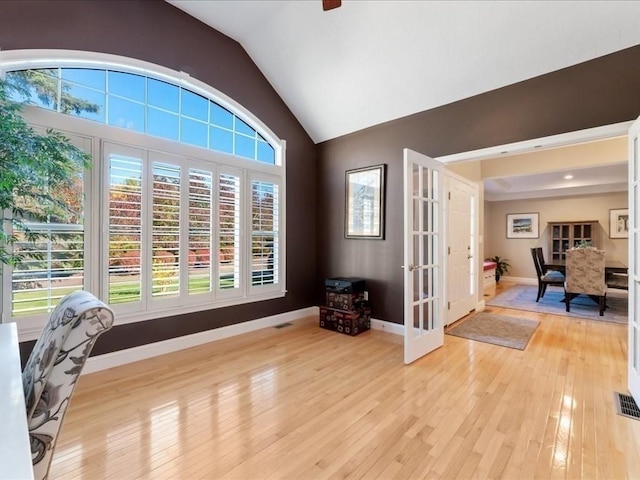26 Silver Brook Ln Unit 26, Norwell, MA 02061 - home office featuring light wood-type flooring, lofted ceiling, and french doors