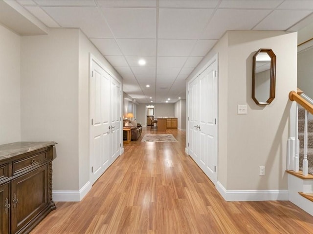 26 Silver Brook Ln Unit 26, Norwell, MA 02061 - corridor featuring light wood-type flooring, a drop ceiling, stairs, and recessed lighting