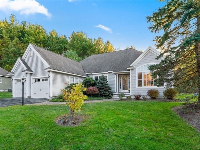26 Silver Brook Ln Unit 26, Norwell, MA 02061 - view of front of house with driveway, a front yard, and an attached garage