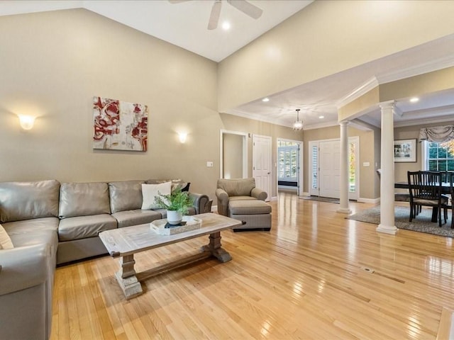 26 Silver Brook Ln Unit 26, Norwell, MA 02061 - living area featuring ornate columns, light wood-style floors, ornamental molding, a ceiling fan, and healthy amount of natural light