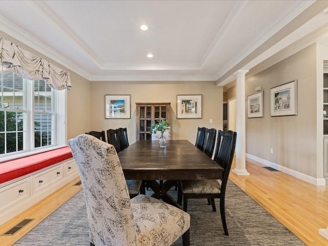26 Silver Brook Ln Unit 26, Norwell, MA 02061 - dining space featuring decorative columns, crown molding, light wood-style flooring, a tray ceiling, and recessed lighting