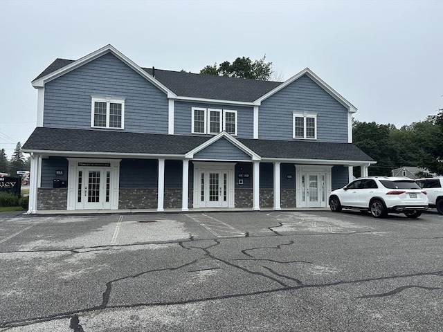 83C Maple Ave Unit C, Rutland, MA 01543 - view of front of house featuring french doors, a shingled roof, and covered porch