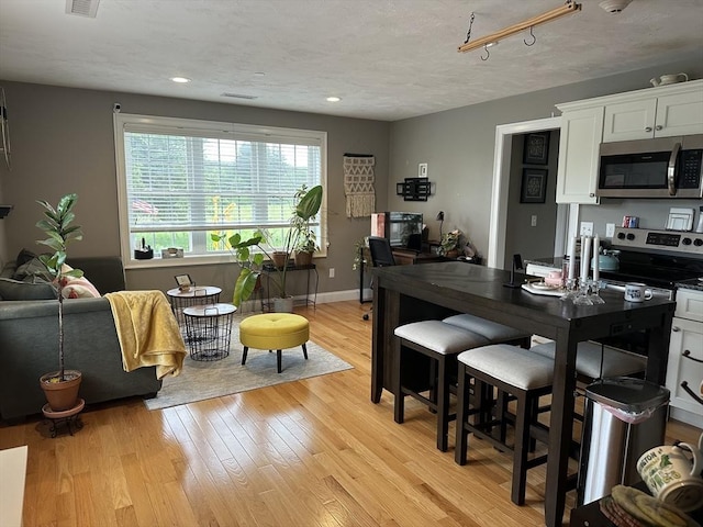 83C Maple Ave Unit C, Rutland, MA 01543 - dining room featuring light wood-style flooring and recessed lighting