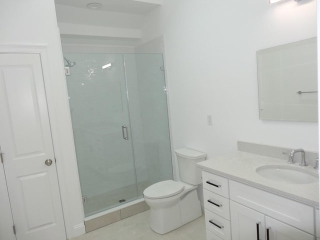 83 Johnson Woods Dr Unit 83, Reading, MA 01867 - bathroom featuring a stall shower, toilet, vanity, and tile patterned flooring
