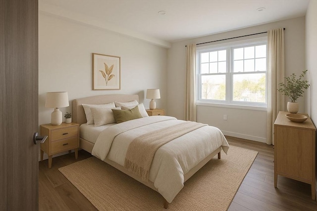 43-47 Fremont Unit 9, Boston, MA 02126 - bedroom with baseboards and wood finished floors