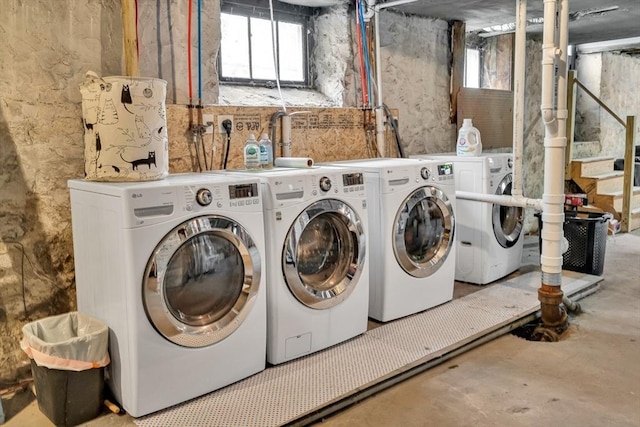 laundry area with washing machine and dryer