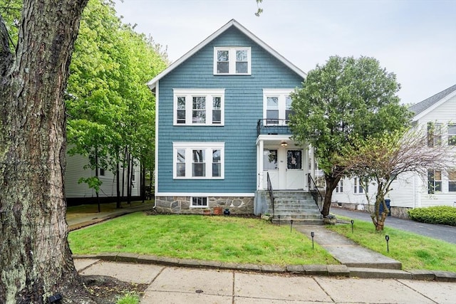 view of front of house with a front yard