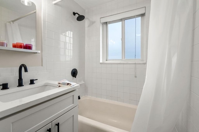 bathroom with tasteful backsplash, shower / bath combination with curtain, and vanity