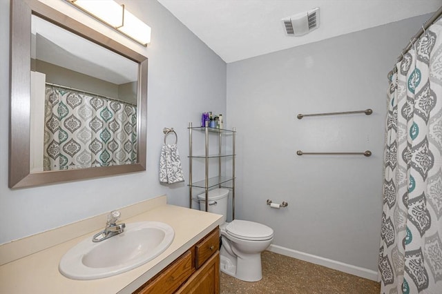 bathroom featuring toilet, baseboards, visible vents, and vanity