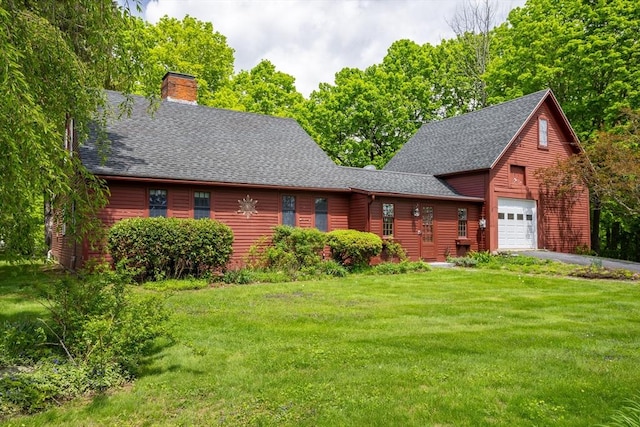 9 Eaton St, Gardner, MA 01440 - chalet / cabin with a chimney, a shingled roof, a front yard, and asphalt driveway