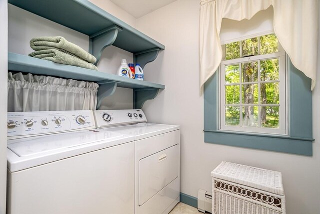 9 Eaton St, Gardner, MA 01440 - laundry area featuring baseboard heating and separate washer and dryer