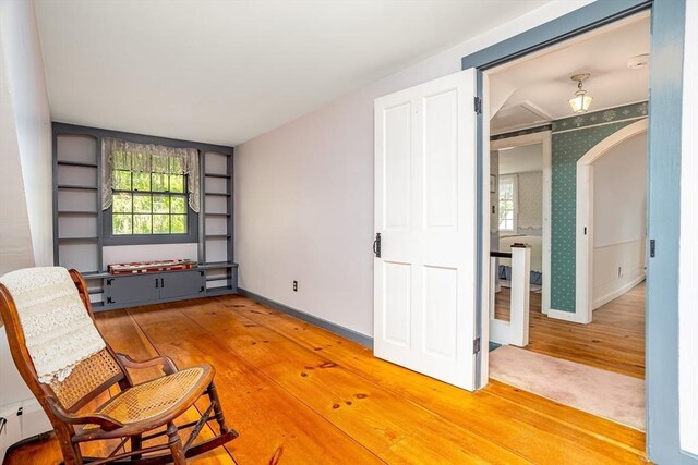 9 Eaton St, Gardner, MA 01440 - living area with hardwood / wood-style floors, baseboards, and wallpapered walls