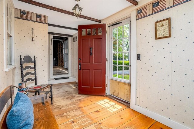 9 Eaton St, Gardner, MA 01440 - entrance foyer with light wood finished floors and beam ceiling