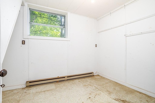 9 Eaton St, Gardner, MA 01440 - spare room with a baseboard radiator