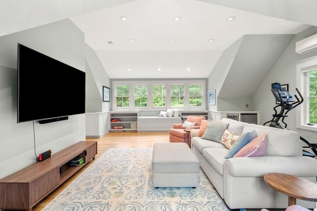 1 Crooked Ln, Manchester, MA 01944 - living area featuring lofted ceiling, an AC wall unit, light wood finished floors, and recessed lighting