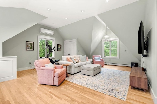 1 Crooked Ln, Manchester, MA 01944 - living room featuring a wall mounted AC, a baseboard radiator, healthy amount of natural light, vaulted ceiling, and wood finished floors