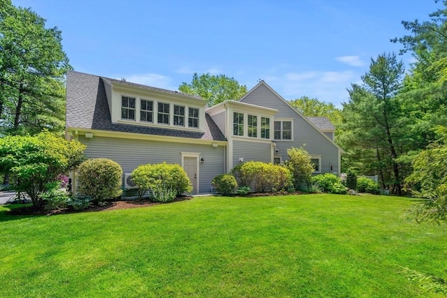 1 Crooked Ln, Manchester, MA 01944 - back of property featuring a lawn and roof with shingles