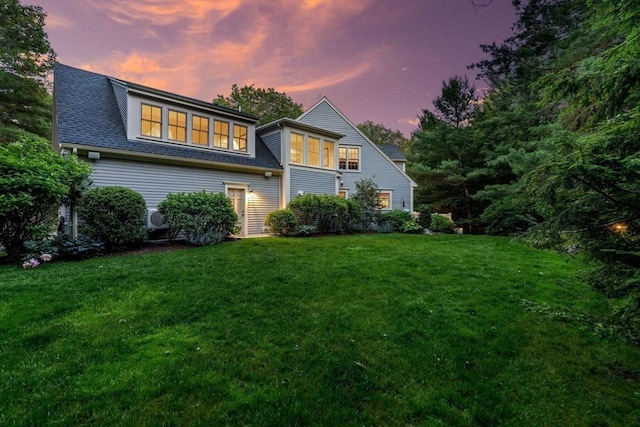 1 Crooked Ln, Manchester, MA 01944 - rear view of property with a lawn and roof with shingles