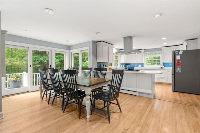 1 Crooked Ln, Manchester, MA 01944 - dining room with light wood finished floors, recessed lighting, and baseboard heating
